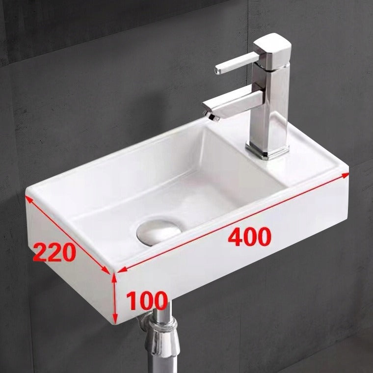 Téglalap alakú, fehér kerámia mosdó, 40x22 cm