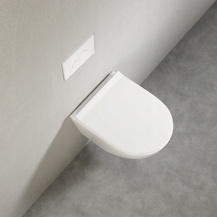 Fehér perem nélküli WC csésze lassan záródó duroplast ülőkével – fali WC örvénylő öblítéssel